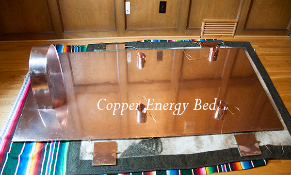 Copper Energy Bed showing side plates for additional crystals